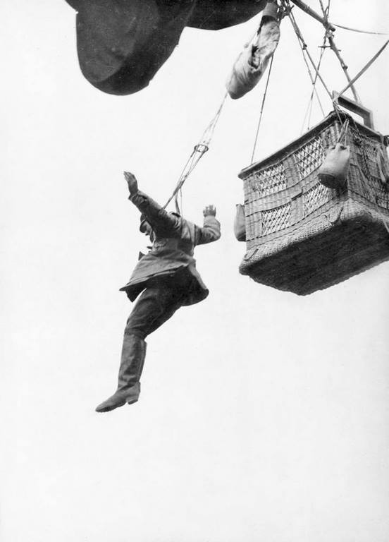 A German observer leaps from his balloon with a parachute, 1916.