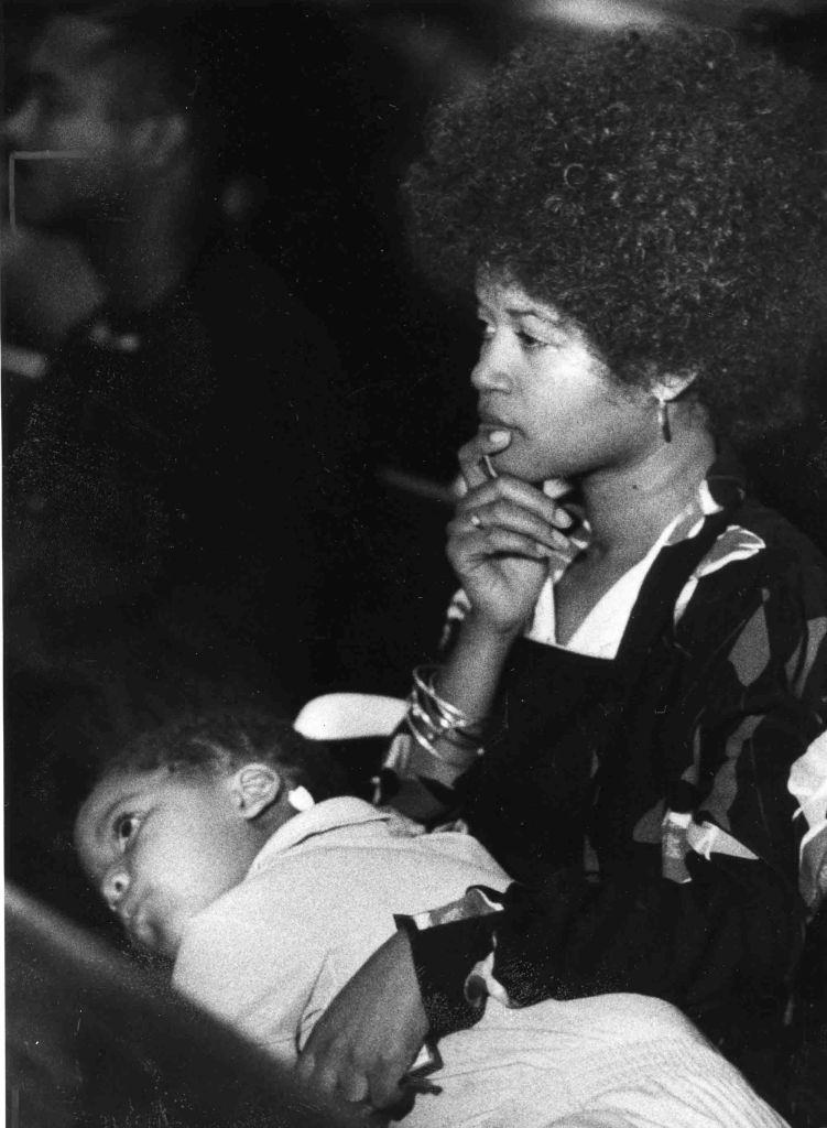 Lorraine Bond, a lifelong resident of Osage Avenue, and her daughter, Chantee, attend a service at Saint Carthage Church in Philadelphia on May 19, 1985.