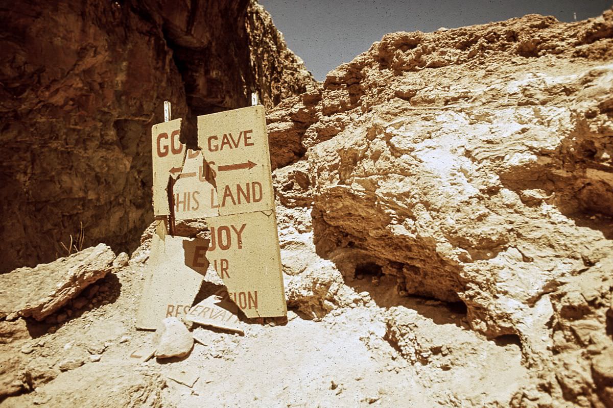 A sign damaged by tourists in Havasupai country.