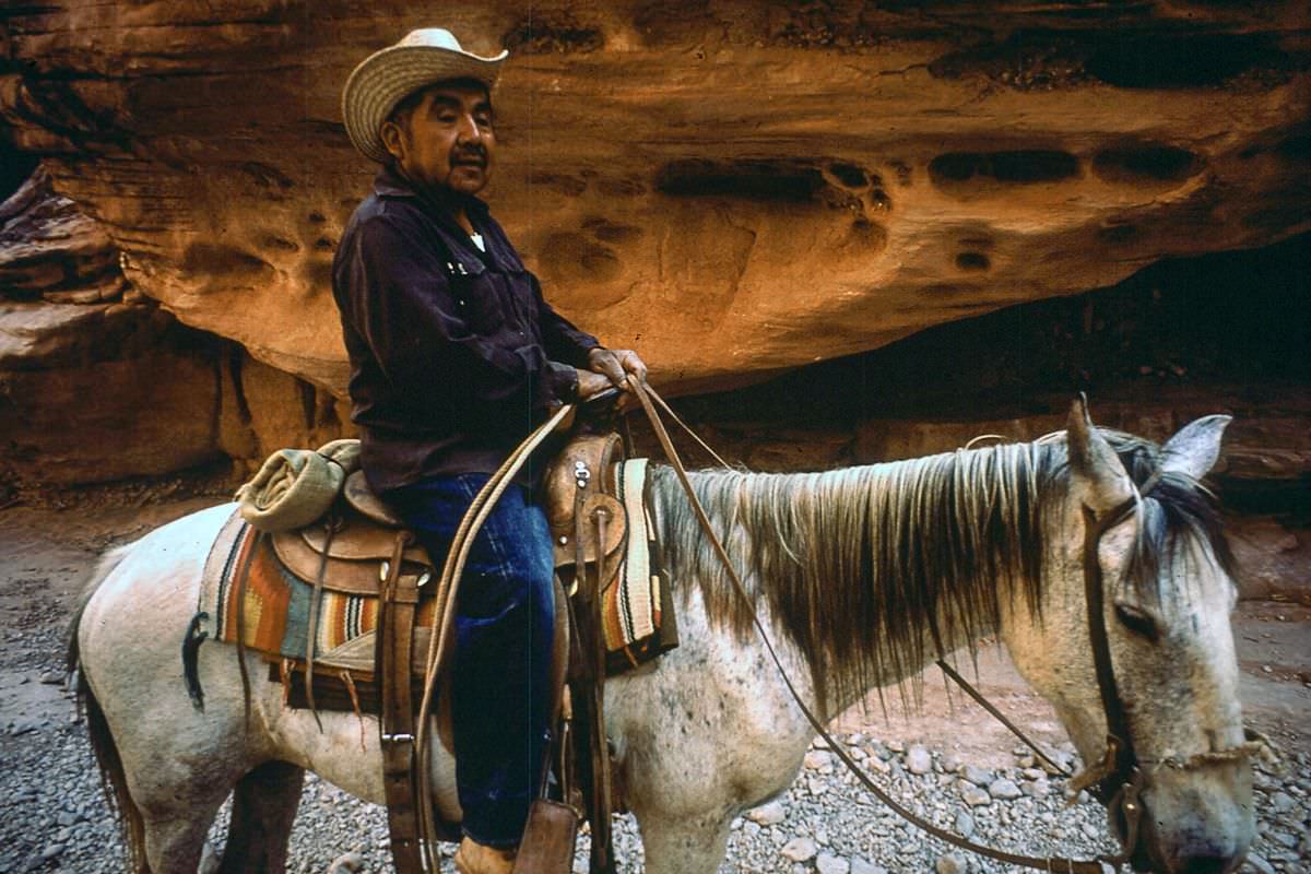 A Havasupai man rides into the Grand Canyon on the way to the village of Supai, Arizona.