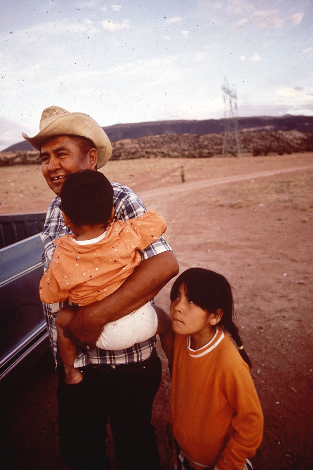 A Navajo father and children in Arizona.