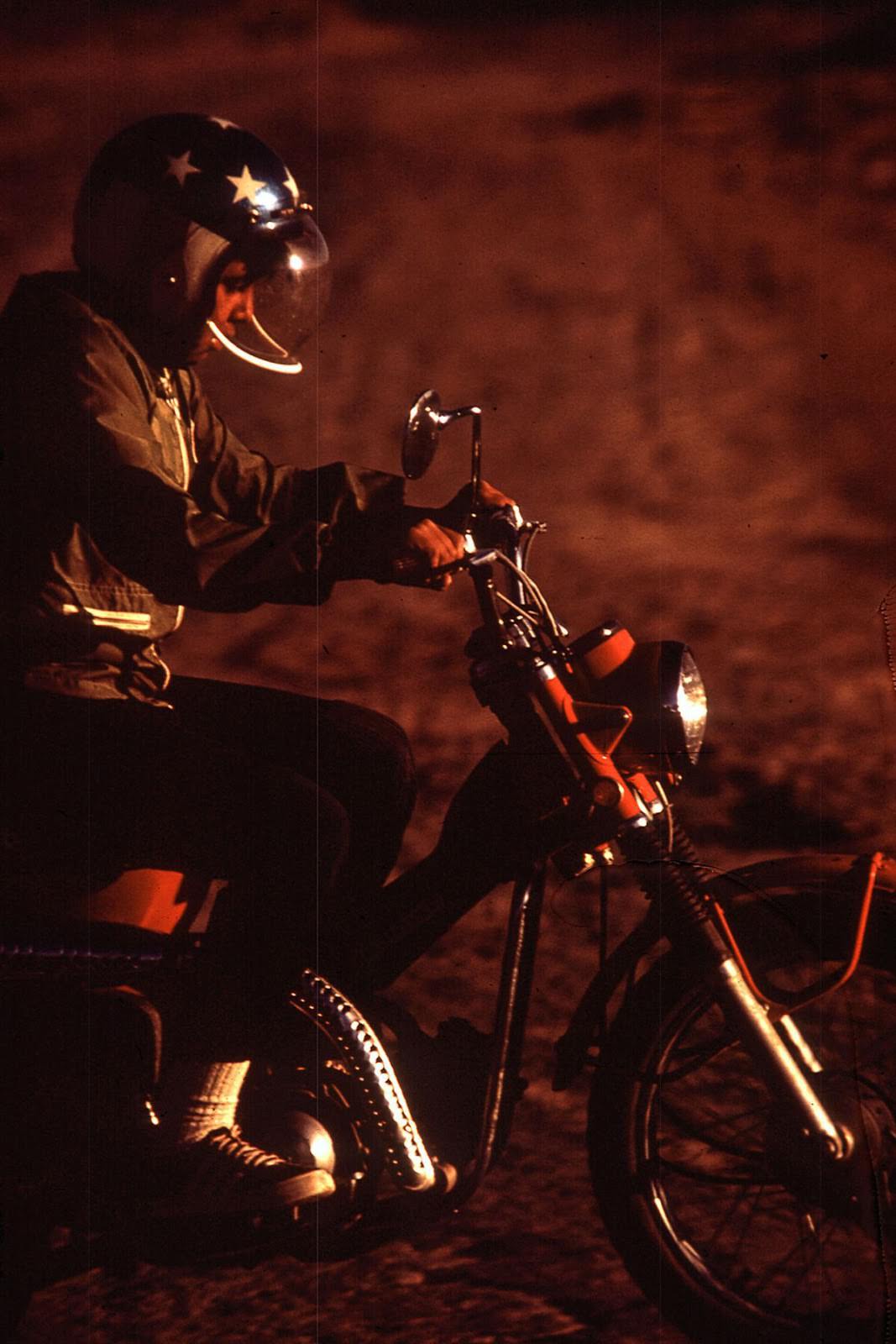 A young Navajo rides a motorcycle in Window Rock, Arizona.