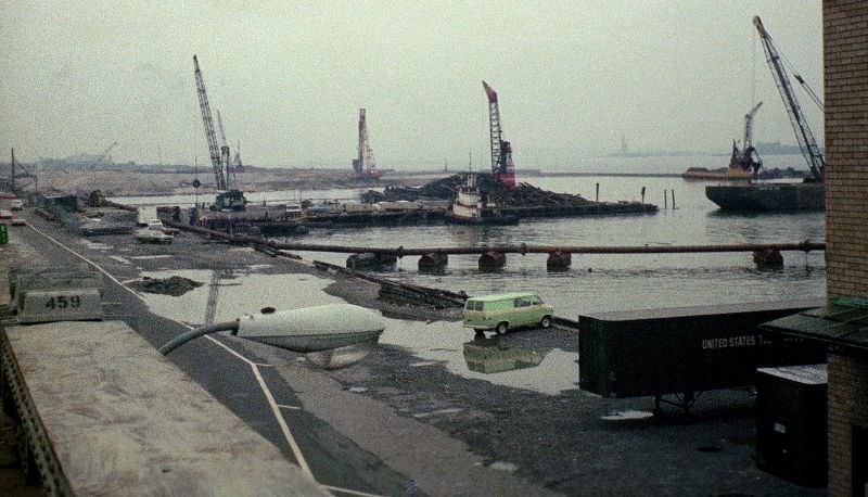 Battery Park City being created from soil dug out to build the World Trade Center, Statue of Liberty in the distance,March 1974