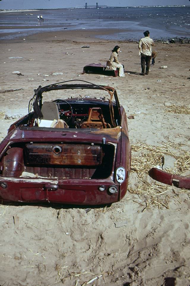 A lot of abandoned car chunks of a Triumph Spitfire at Plum Beach near Sheepshead Bay in Brooklyn, May 1973