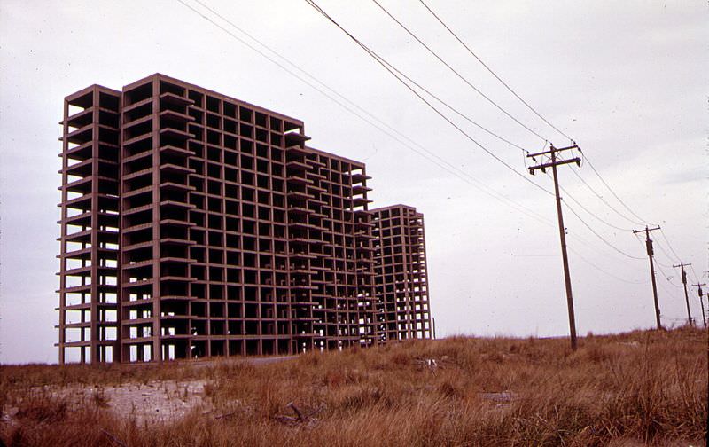 Breezy Point in Queens, New York near the Atlantic Ocean with the abandoned skeleton of an apartment building that was never finished, June 1973