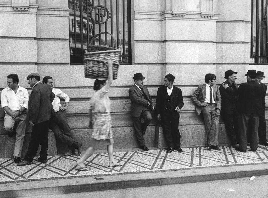Group of men on the street in Lisbon, Portugal, 1970.