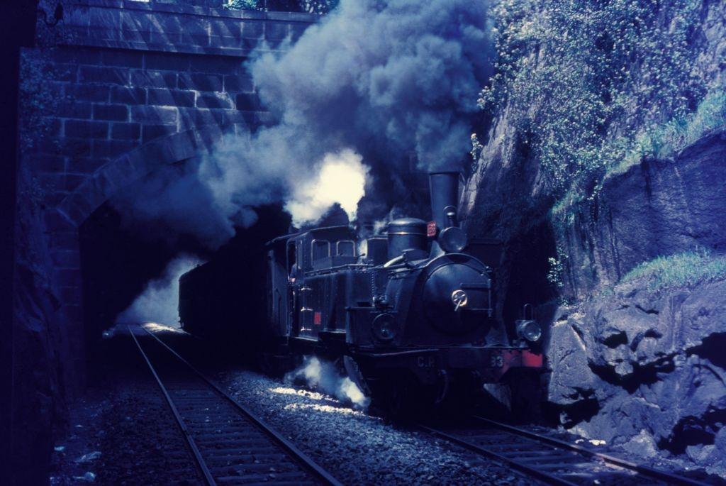 Portuguese meter gauge suburban network which radiates out of Oporto Trindade station with a Kessler built 2-6-0T of 1886 with a train from Fafe on Friday 4th September 1970.