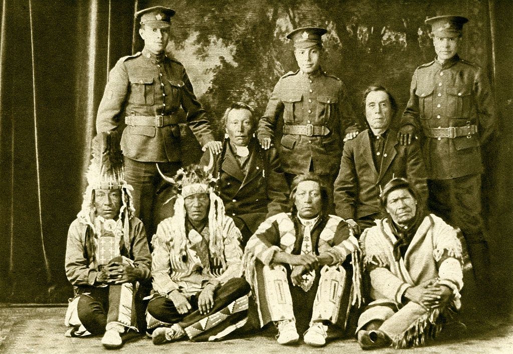 Cree First Nations Canadians during World War 1. Three generations with grandsons in army uniform, Saskatchewan, 1916.