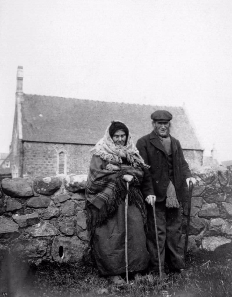 Two people in front of Kilmuir Free Church, Skye, 1906. Titled: 'Witnesses - Kilmuir'