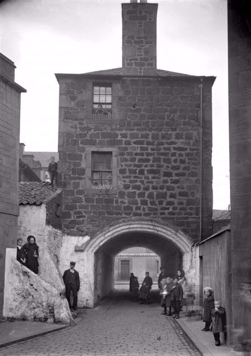 The Citadel Arch, Dock Street, Edinburgh with people, c.1912.