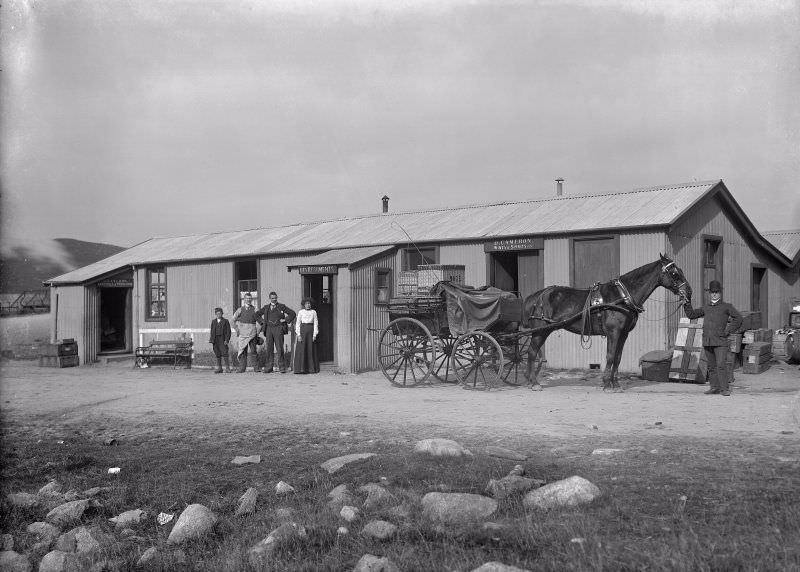 General view of building including horse and cart in foreground outside of 'D. Cameron, Groceries & Provisions, Refreshments and Wines & Spirits,' 1904. Possibly business of Duncan Cameron located near Rannoch Station or Kinloch-Rannoch.