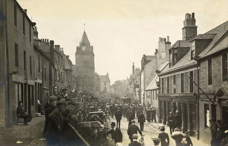 View of High Street, South Queensferry, 1907. Titled: 'South Queensferry, 'Channel Fleet visit 1907'.