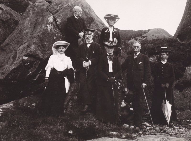 Group of seven people at excursion, c.1905. Titled: 'Ms Thom, Prof. Sir A Geickie, Mrs Thom'.