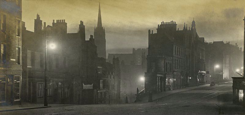 View of Edinburgh at night, 1907. Titled: 'Candlemakers Row and George IV Bridge April 1907'.