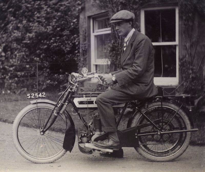 Man on motorcycle, 1909.