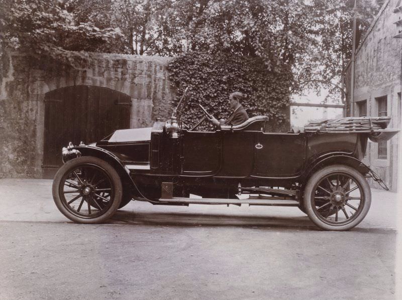 Man in car, 1909.