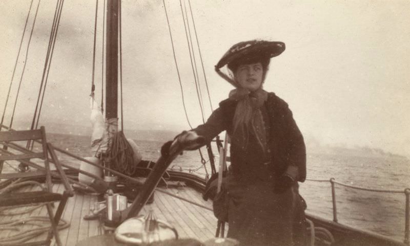 Woman on sailing boat, probably 'Gadfly,' c.1904. Titled: 'S.M (Mrs Hoggenheimn of Park Lane)'.