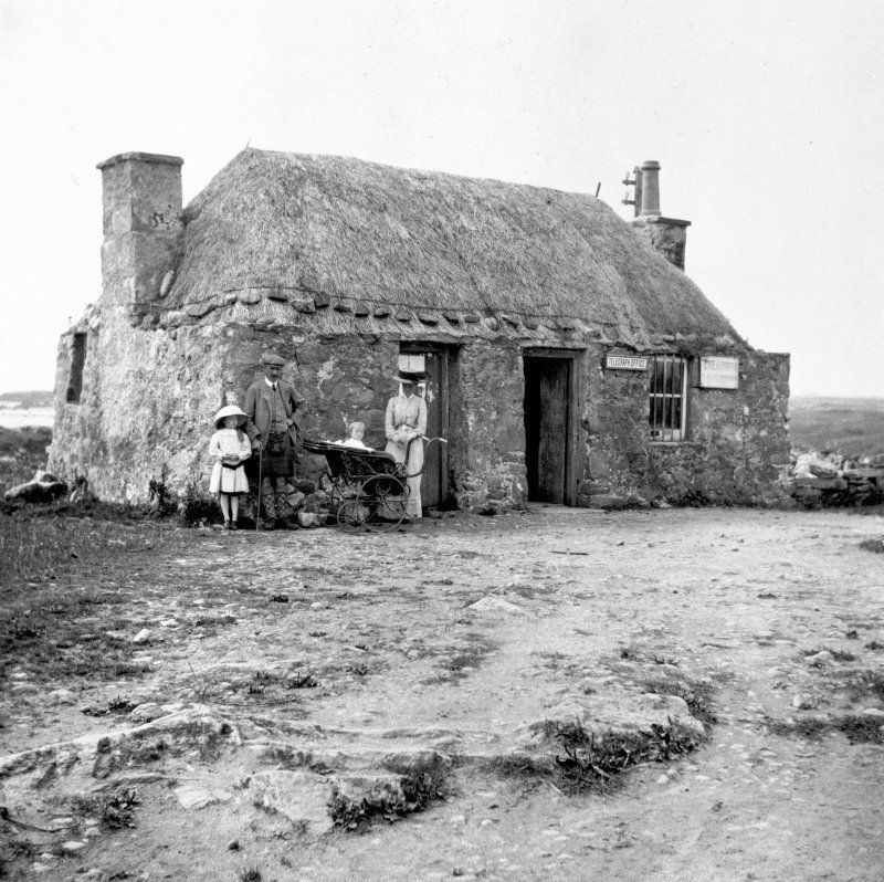 View of telegraph office at Creagorry, Benbecula, with family, 1910.