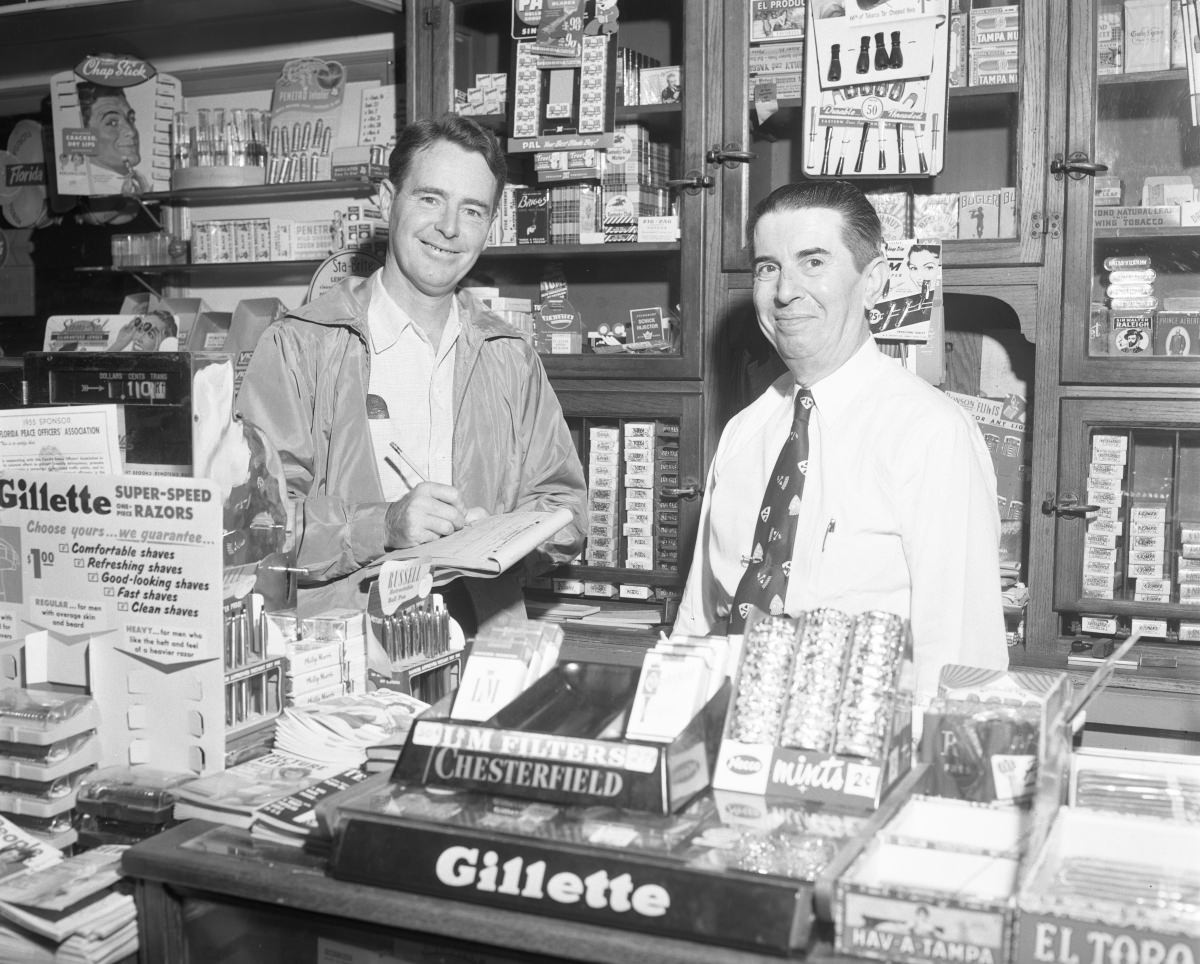 Dennis Christie and salesman at a Tallahassee business – October 17, 1955