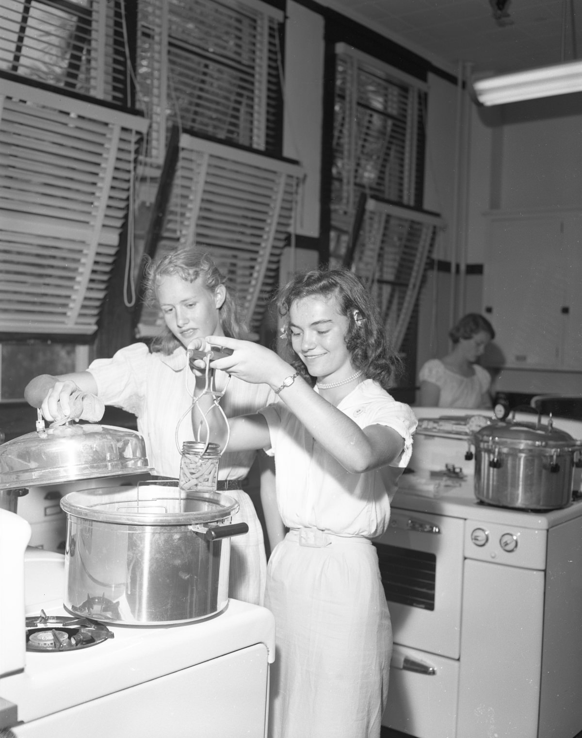 Cooking class – learning to can, 1954