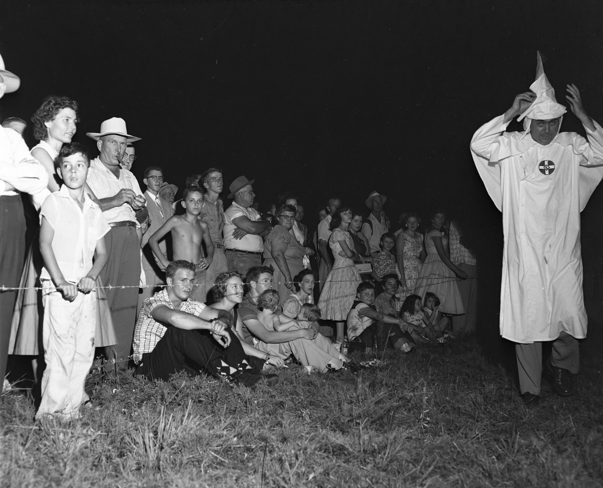Crowd and Ku Klux Klan member at one of the Klan rallies – September 1 1956