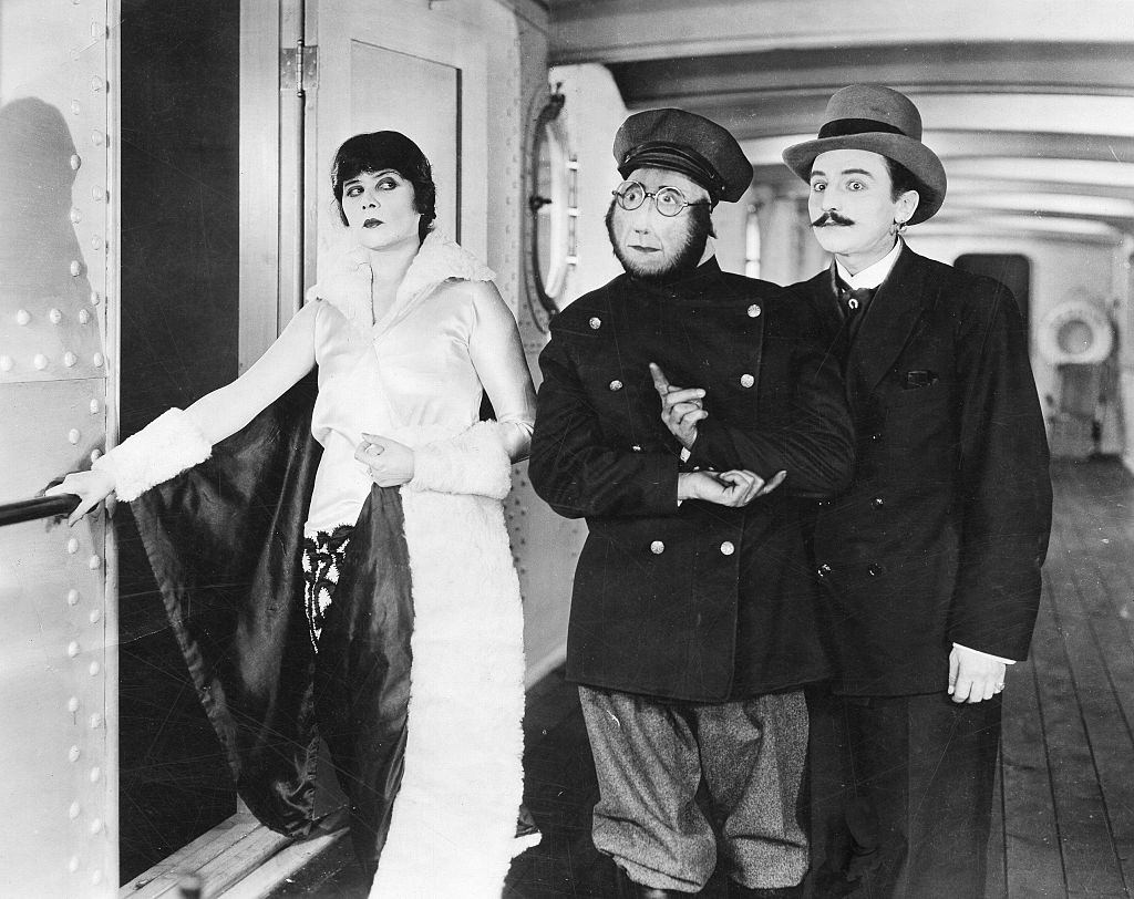 Theda Bara with Jimmie Finlayson and Tyler Brooke in her last movie 'Madame Mystery', 1926.