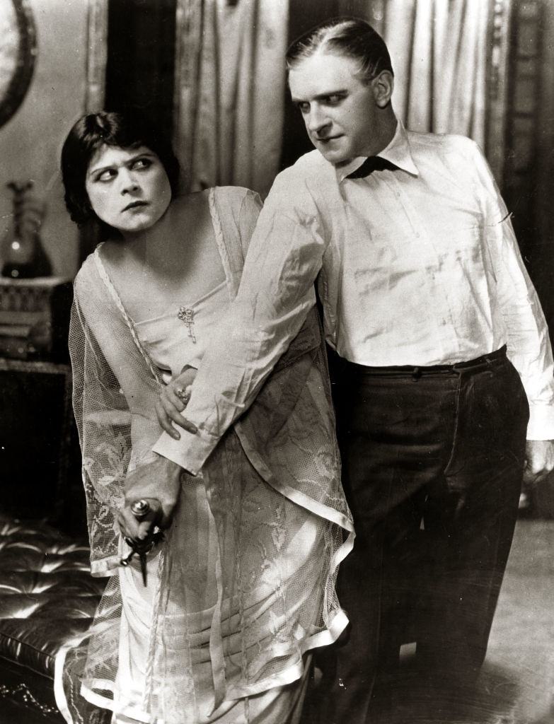 Theda Bara, with William E.Shay in the movie ""The Clemenceau Case", 1910.