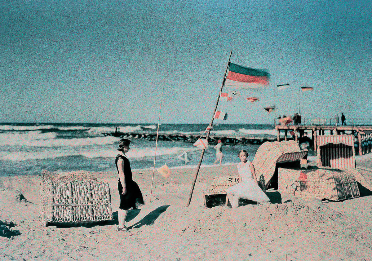 Beach scene with flag. 1925