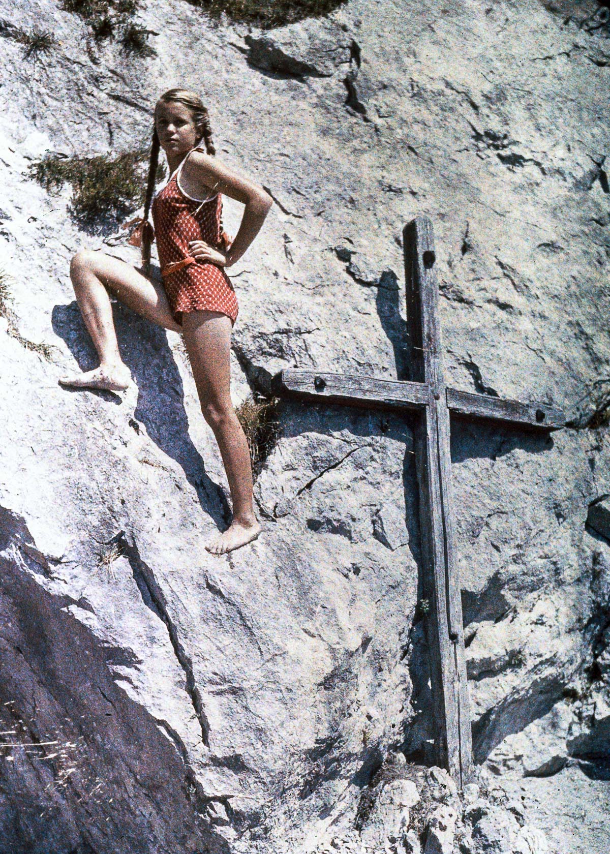 Eva climbing a rock face, Lake Luzern, Switzerland.c. 1927
