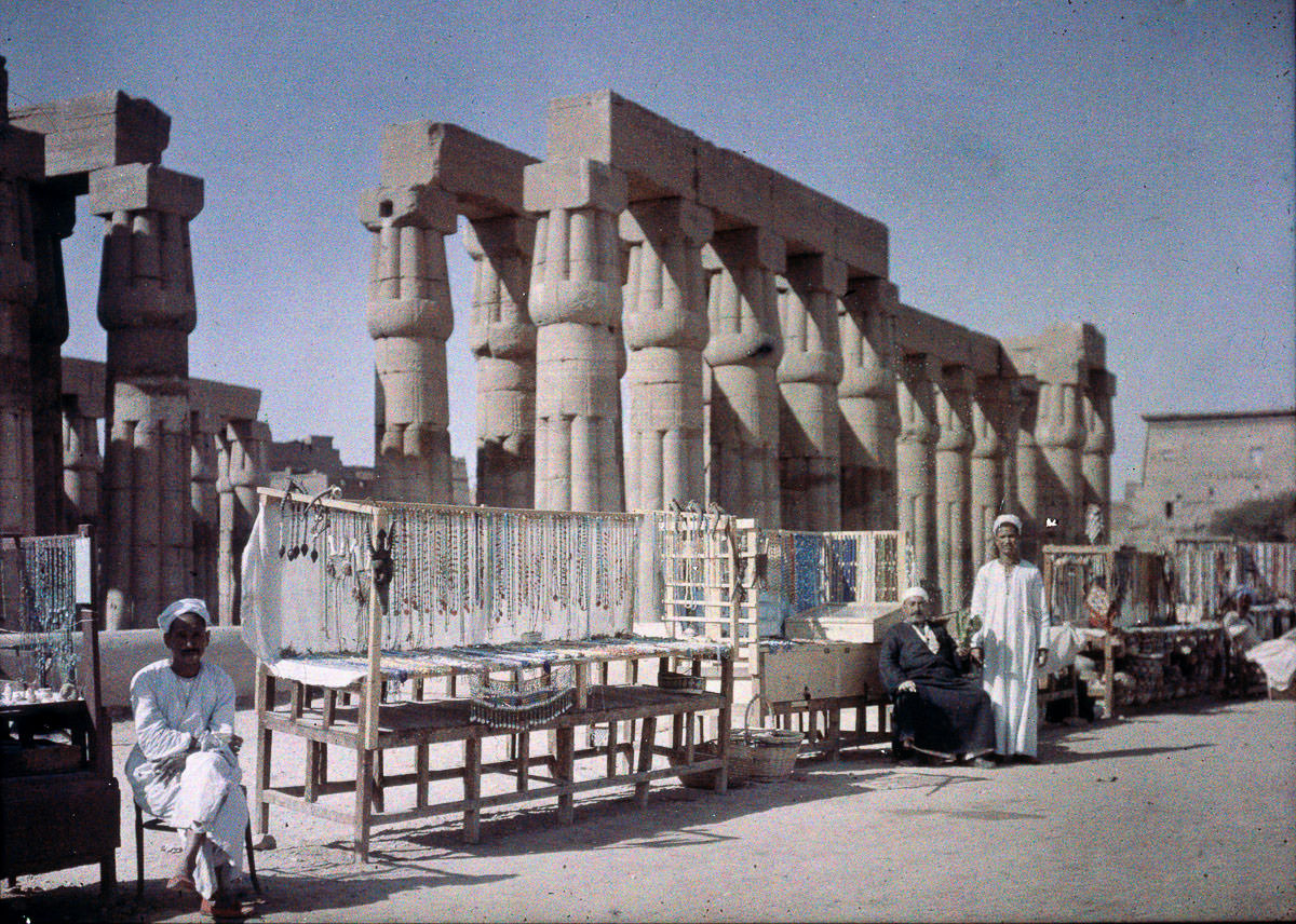 Market stalls outside an Egyptian ruin. 1913
