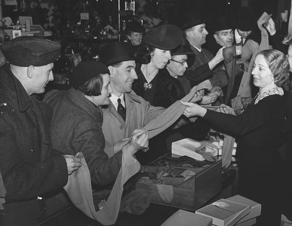 Men buying stockings for their wives and girlfriends during World War II.