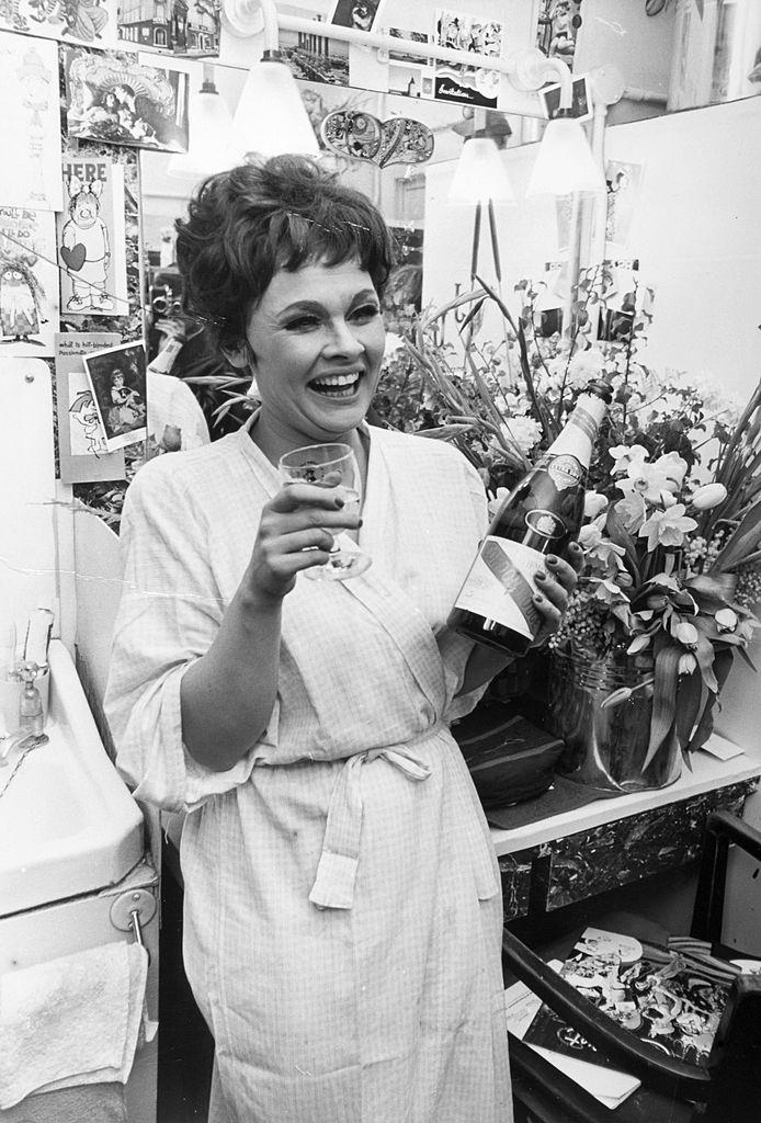 Judi Dench in her dressing room after the successful first night of the musical "Cabaret", 1965.