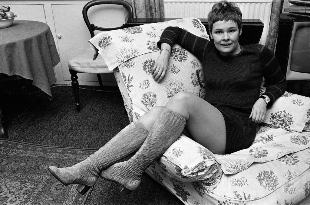 Judi Dench relaxing in the sofa Dench at home, 1967.