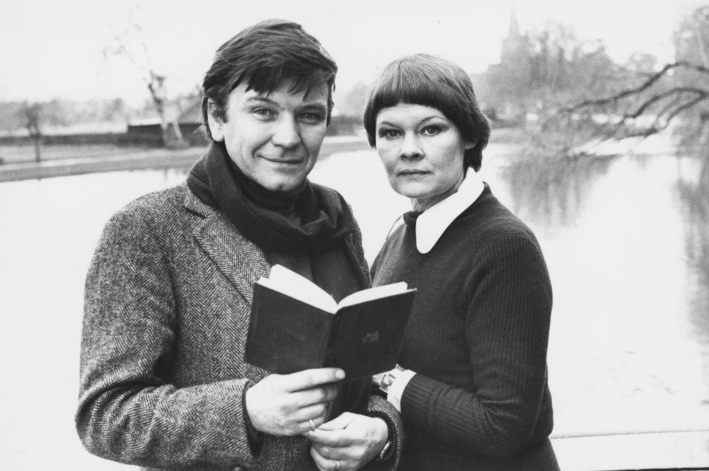 Judi Dench with Michael Williams standing next to a river, January 27th 1977.