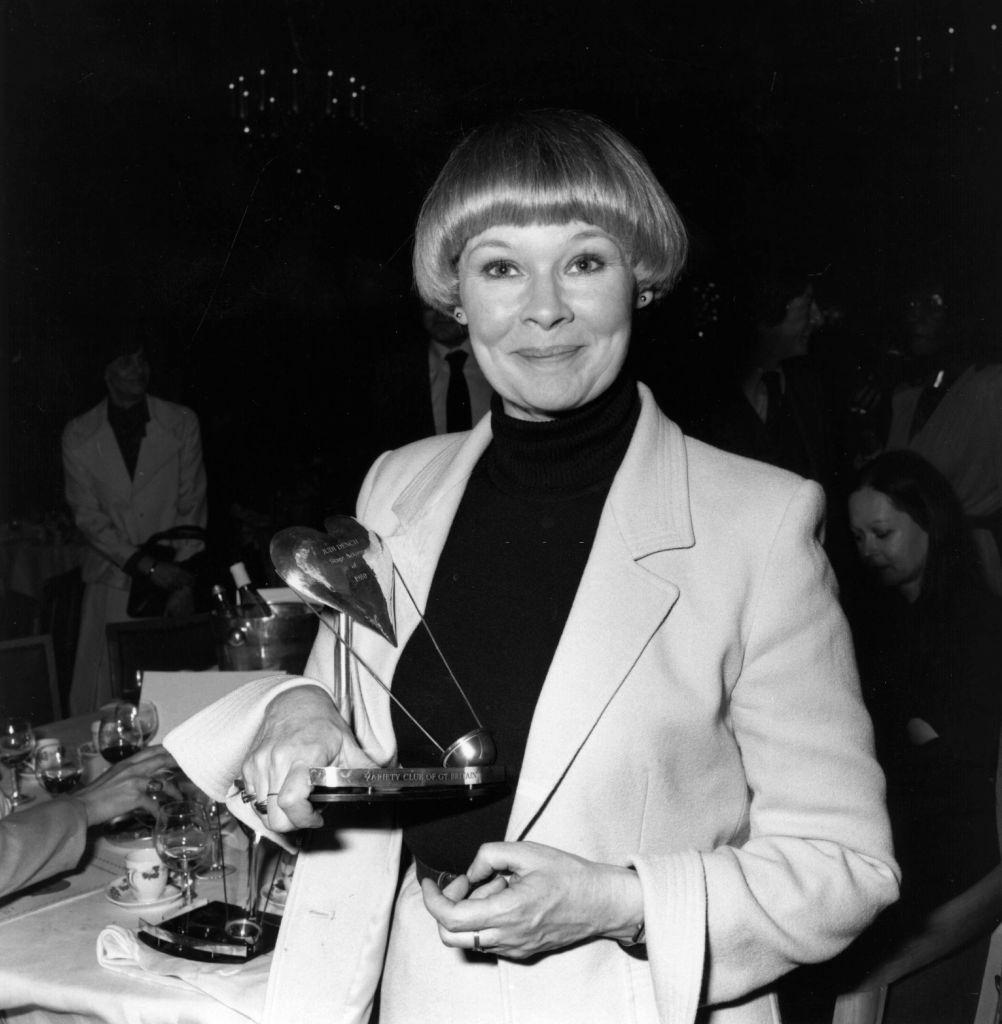 Judi Dench receiving one of her many awards, 1979.