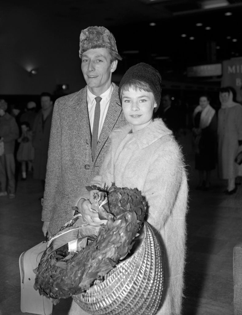 Judi Dench with John Neville at London Airport, 1959.