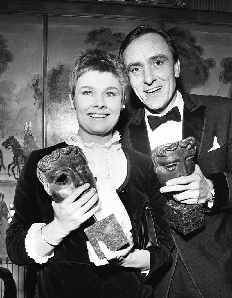 Judi Dench and actor Eric Porter with their British Academy for Film and Television Arts awards, 1967.