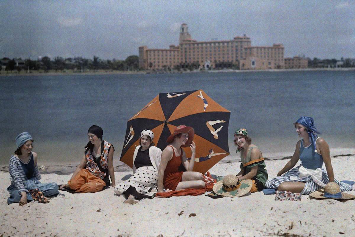 Women sit on the beach. St. Petersburg, Florida.