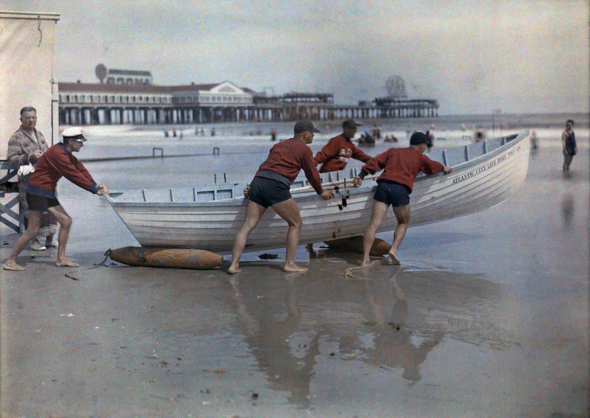 A coastal patrol pushes a boat into the water. Atlantic City, New Jersey