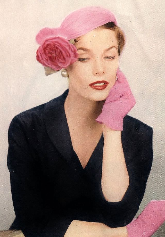 Model in pinky scarf hat, April 1954