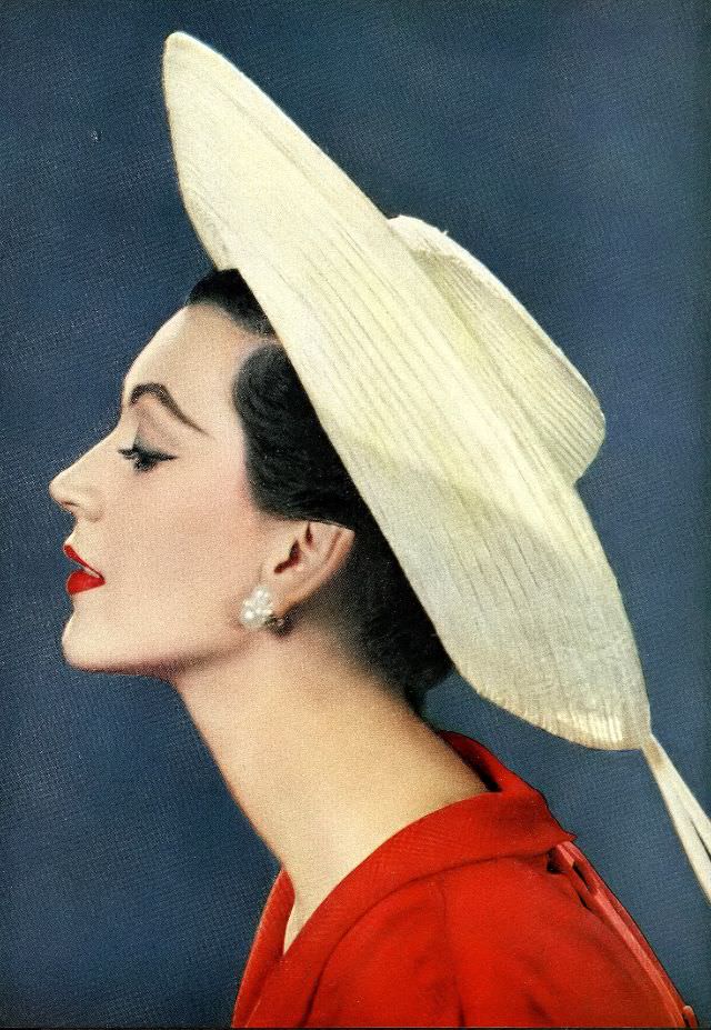 Dovima wearing a hat, April 1958