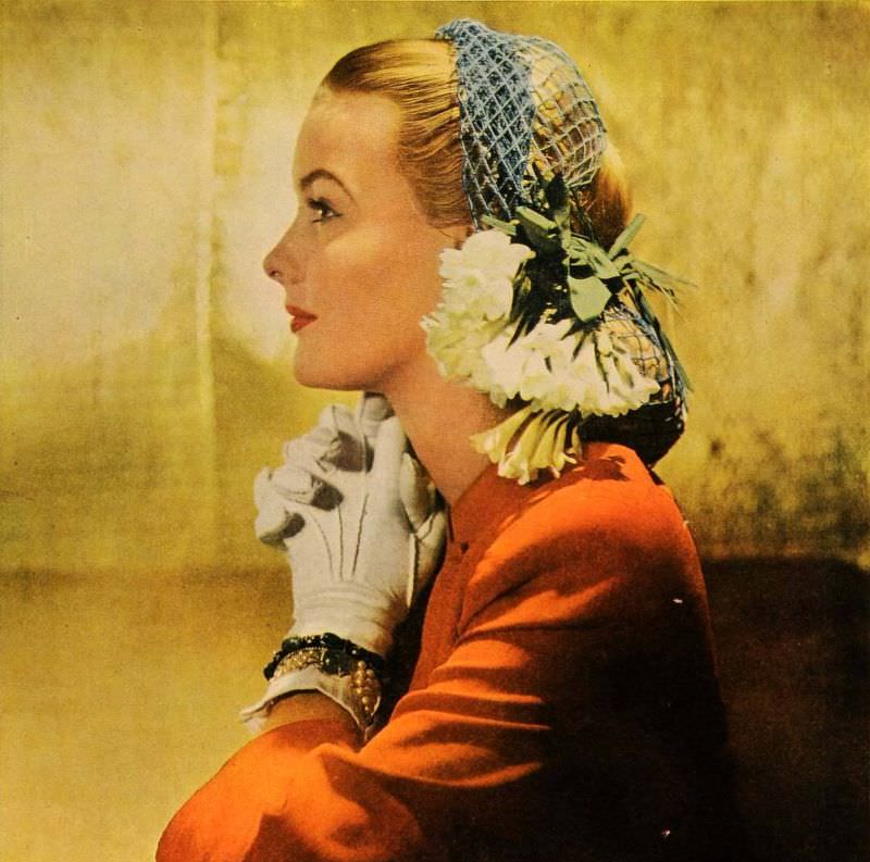 Model wearing a net hat, 1944
