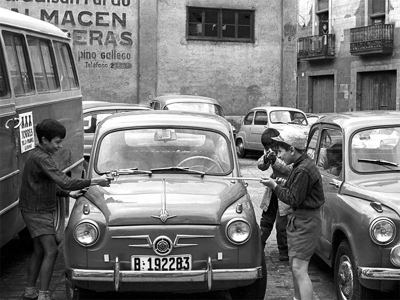 Children playing wiht toys, Barcelona, 1965.