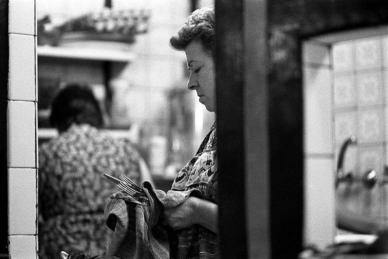 Woman in restaurant in kitchen, Barcelona 1977.