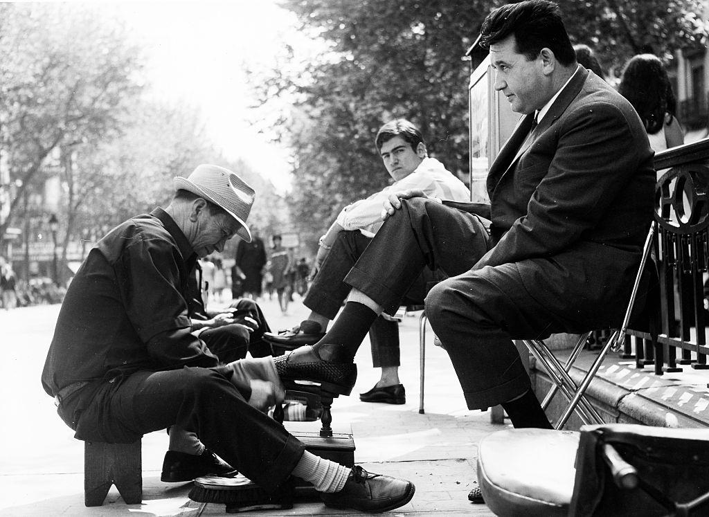 A shoe shiner in Barcelona, 1970.