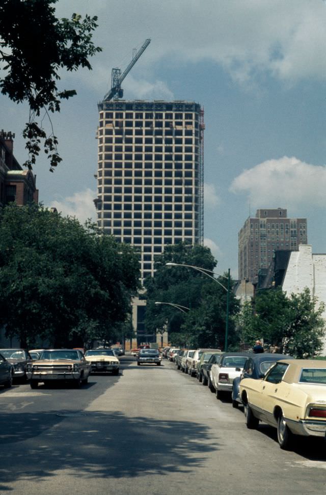 Newberry Plaza condominium tower during construction, looking west along Bellevue Place, 1972