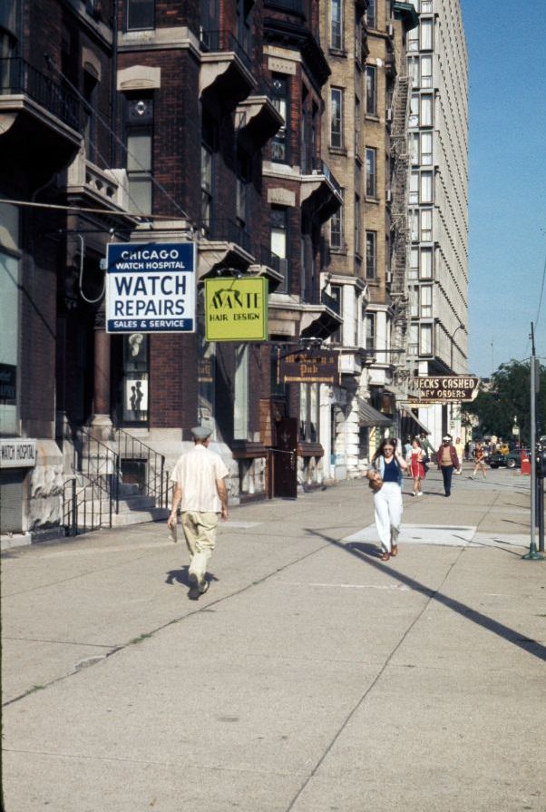 The sidewalk on the north side of East Chicago Avenue towards North Rush Street, 1976