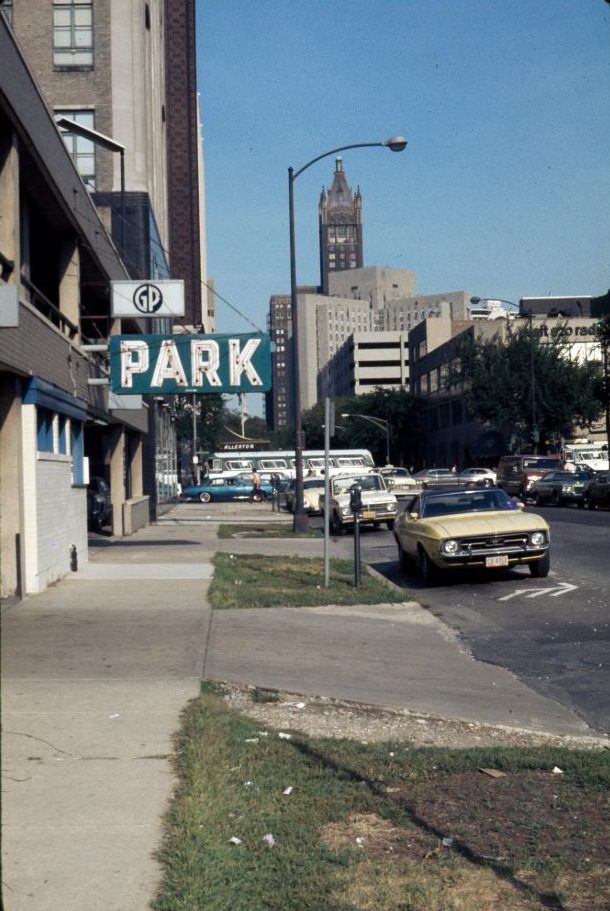 The sidewalk on the north side of East Huron Street from east of Rush Street, 1976