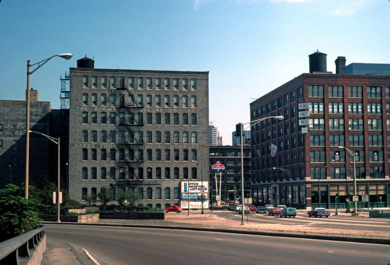 Kennedy Expressway on-ramp towards industrial buildings along North Orleans Street, 1976