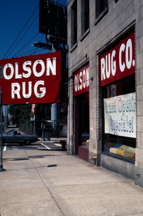 The north side of East Ohio Street, at the intersection with North Rush Street, 1976